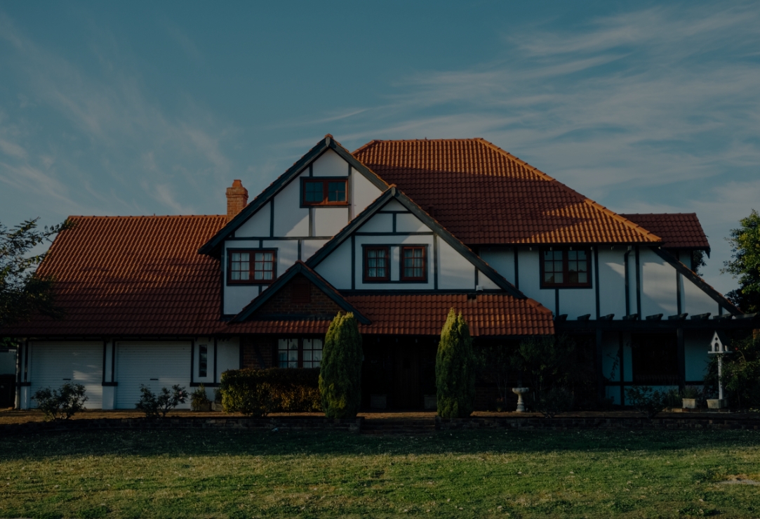 White big house with garden